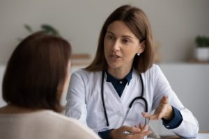 Doctor talking with the patient during a check-up